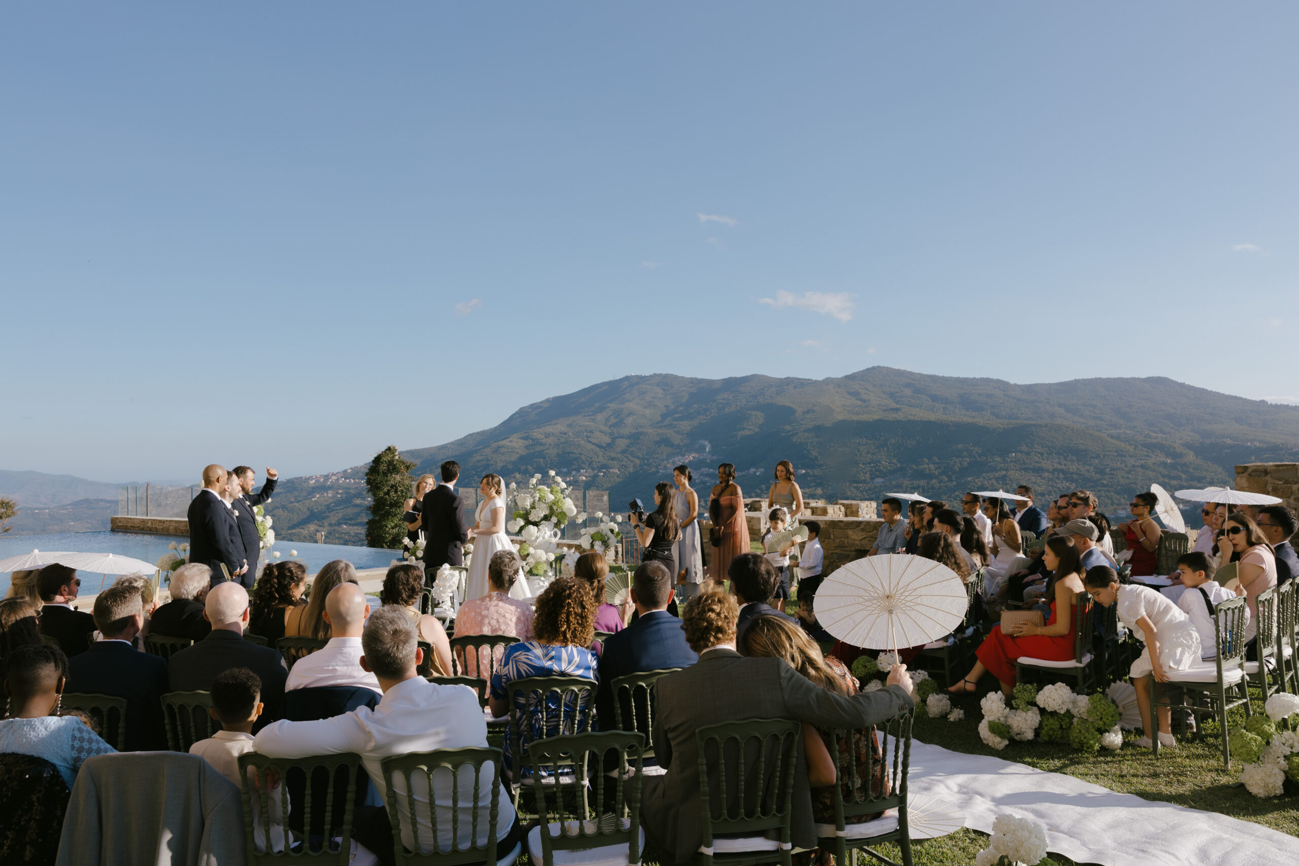 Outdoor wedding ceremony at Castello di Rocca Cilento Italy, photographed by Australian destination wedding photographer Evelina Katarzynski