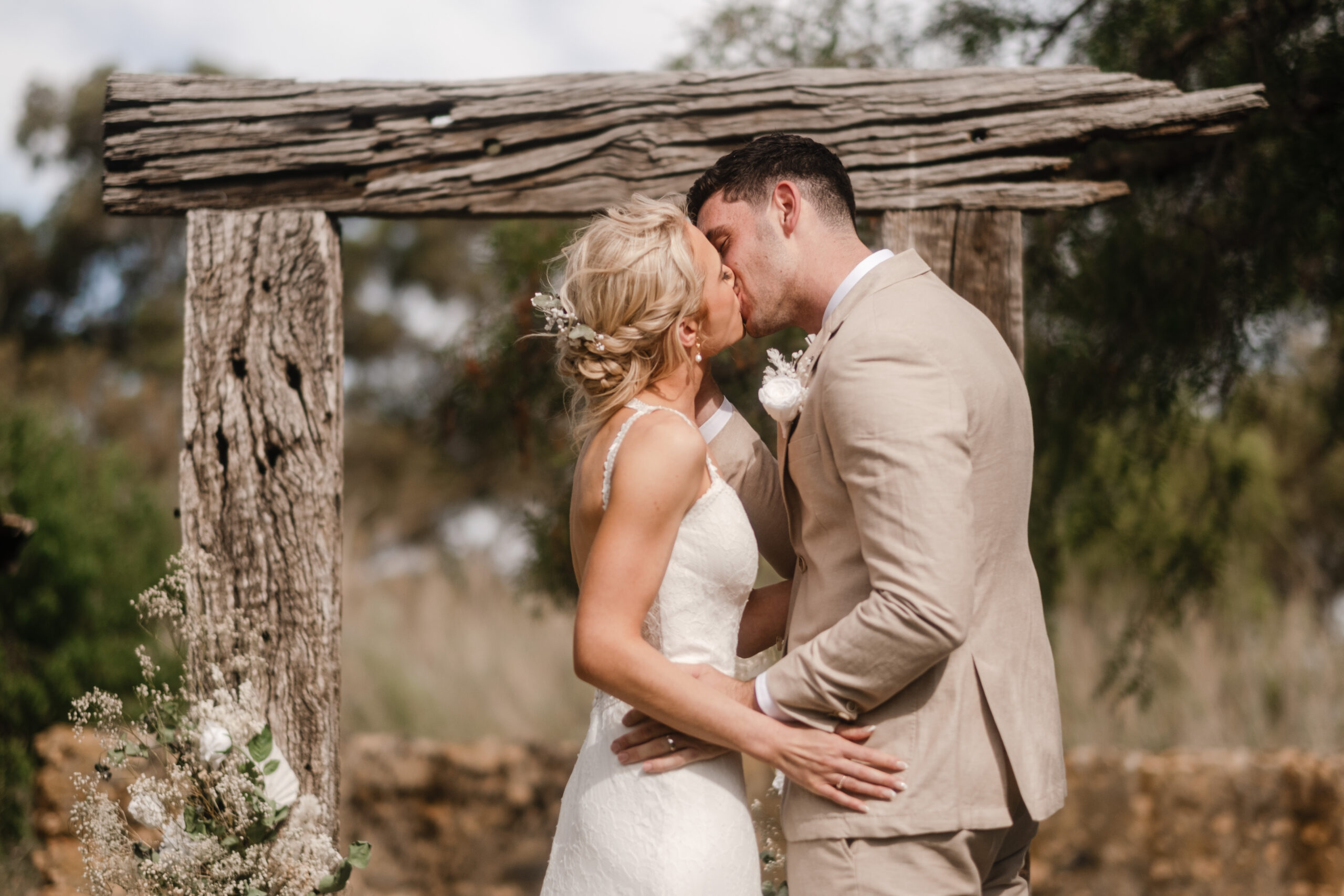 a bride and groom share their first kiss at Bremer Farm in Strathalbyn