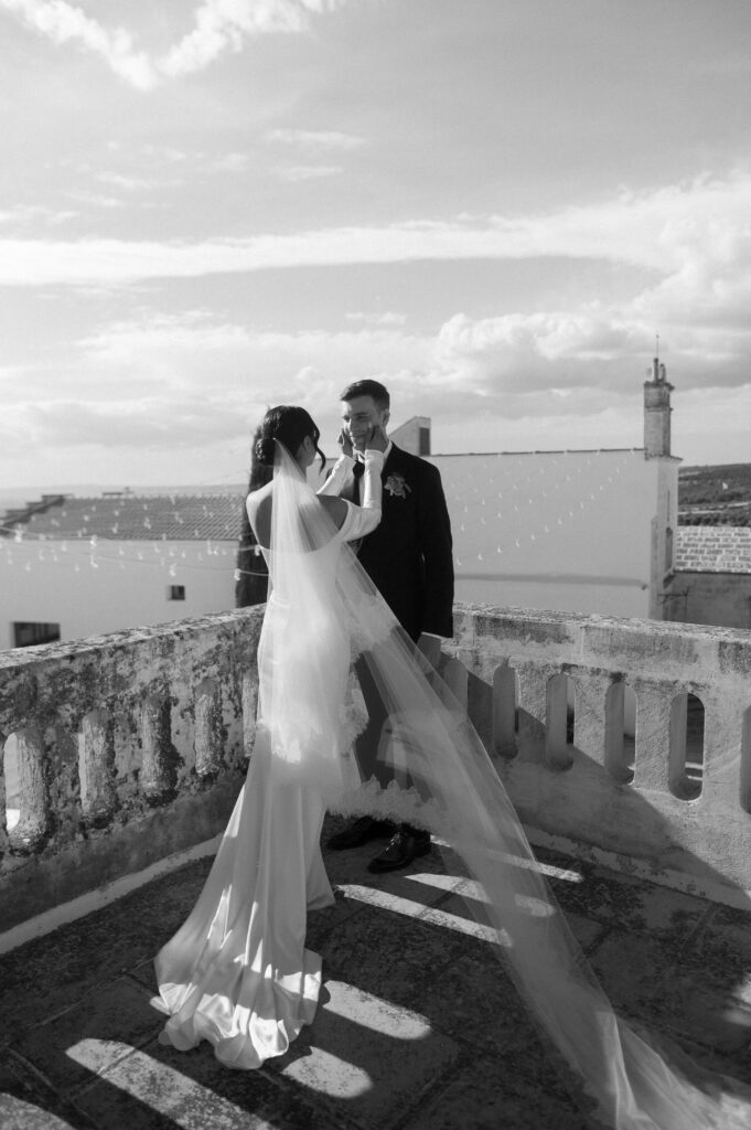 Bride and groom portraits overlooking the Puglia countryside at Masseria Amastuola