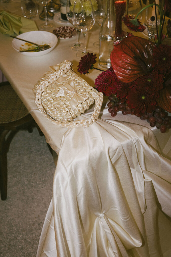 Table styling with florals and candles at a Masseria Amastuola wedding reception