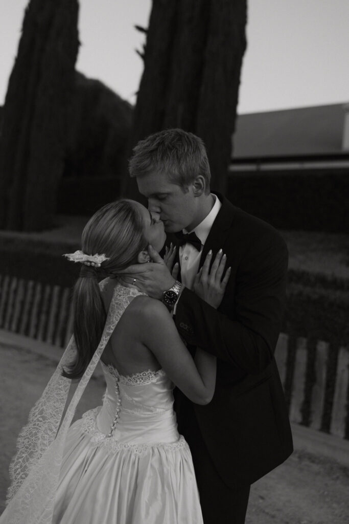 Bride and groom sharing an intimate kiss during sunset at Beresford Estate.